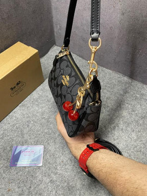 Coach Nolita 19 With Cherry Charm in Signature Canvas