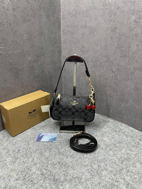 Coach Nolita 19 With Cherry Charm in Signature Canvas