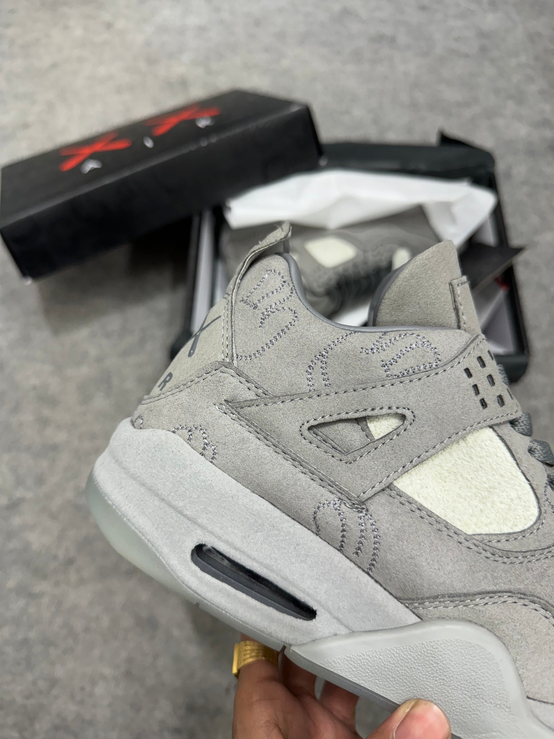 Retro 4 'KAWS' grey