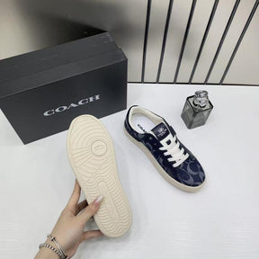Coach Clip Court Sneaker Navy signature canvas