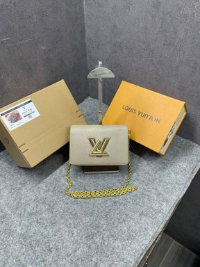 Louis Vuitton Twist MM Bag Crafted Epi Leather Sling Chain Strap Beige