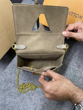 Louis Vuitton Twist MM Bag Crafted Epi Leather Sling Chain Strap Beige
