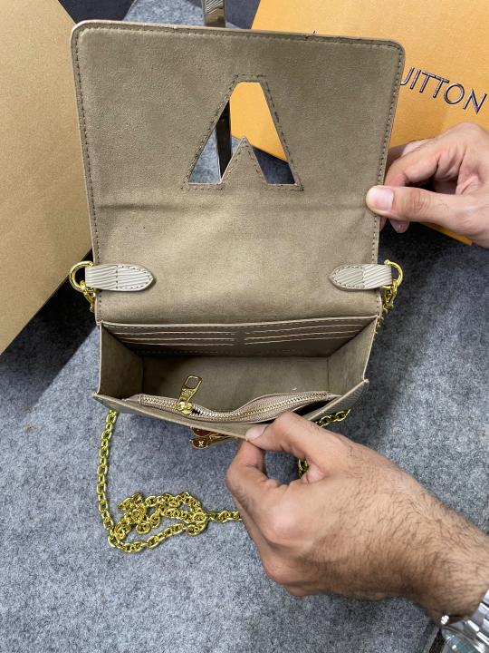 Louis Vuitton Twist MM Bag Crafted Epi Leather Sling Chain Strap Beige